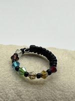 Anello in filo di memoria regolabile con 7 chakra