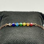 Bracciale in rame con cristalli colorati,ispirati ai sette chakra.