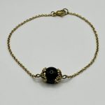 Catena in acciaio dorato con Su Coccu e Ossidiana 8 mm 🧿🖤