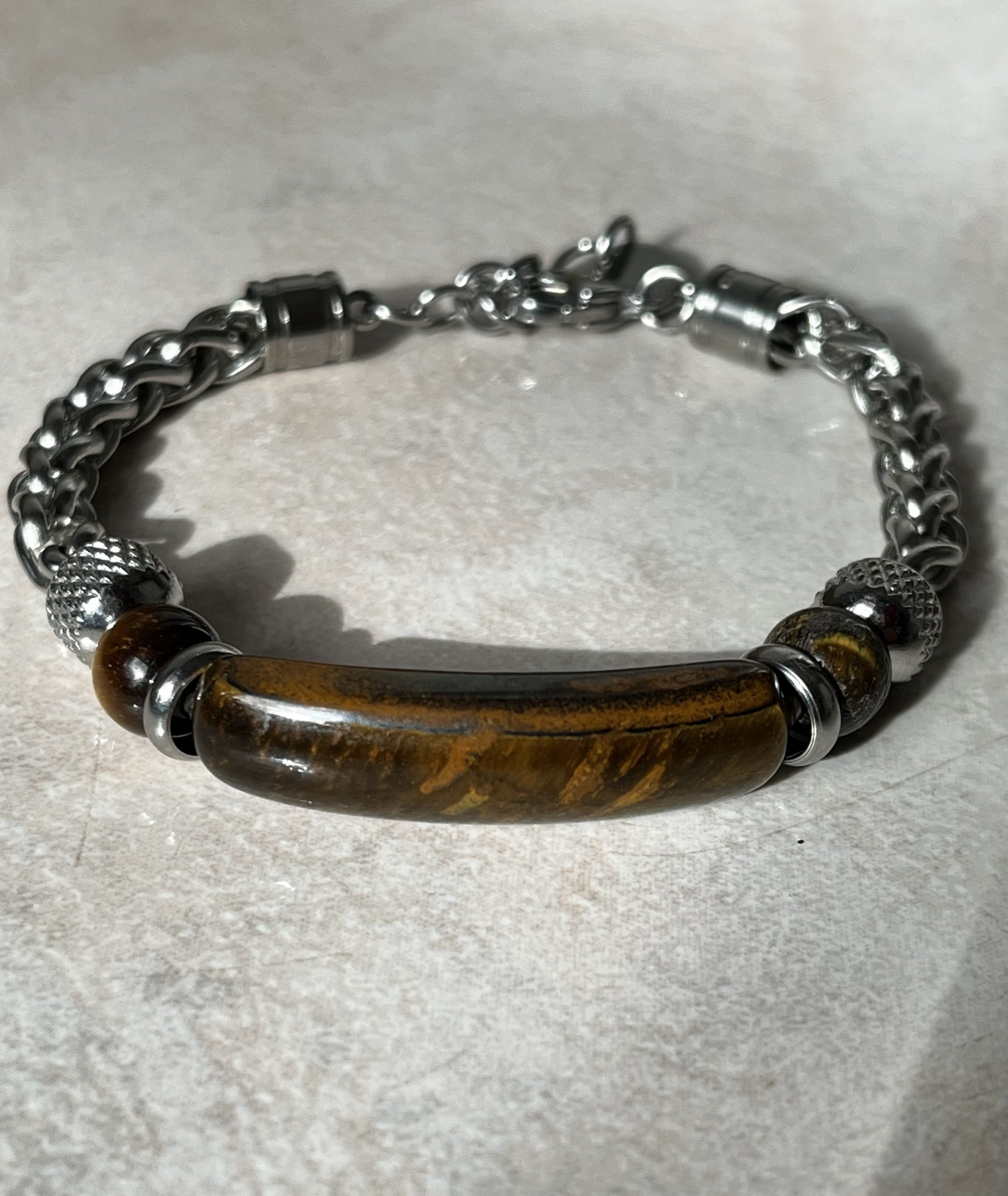 img_1385 π
Bracciale in Acciaio con Occhio di Tigre β Forza e Determinazione - immagine 1
