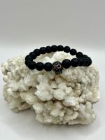 Bracciale Uomo in Pietra Lavica 8 mm con Teschio e Occhi Arancioni – Energia, Protezione e Stile Audace💀 - immagine 2