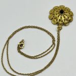 Collana con Ciondolo in Filigrana Sarda Dorata e Ossidiana Nera – Tradizione e Protezione