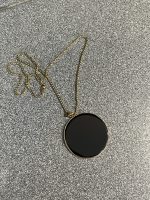 Collana specchio di ossidiana dorato
